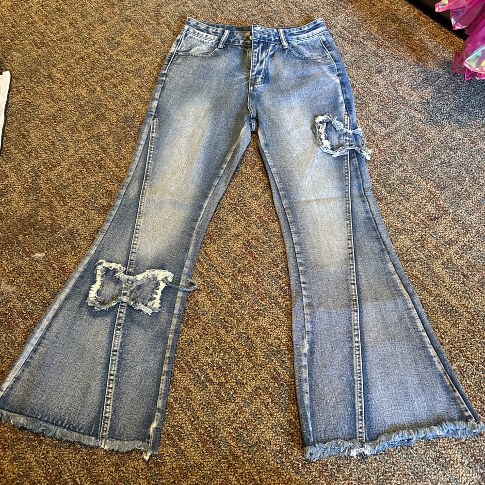 Women's Blue Flared Jeans with Distressed Details
